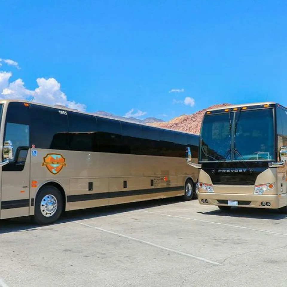 A coach parked at a desert visitor stop