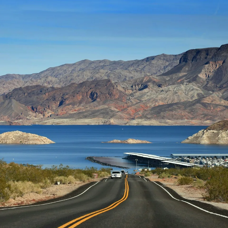 A road descending towards Lake Mead and a marina