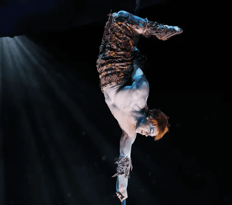 Michael Jackson ONE dancer balancing upside down on one hand