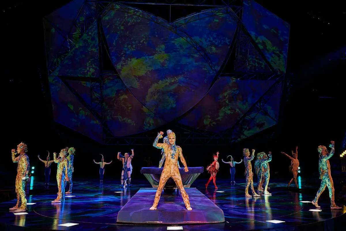 Mystère ensemble performing on a blue-lit stage
