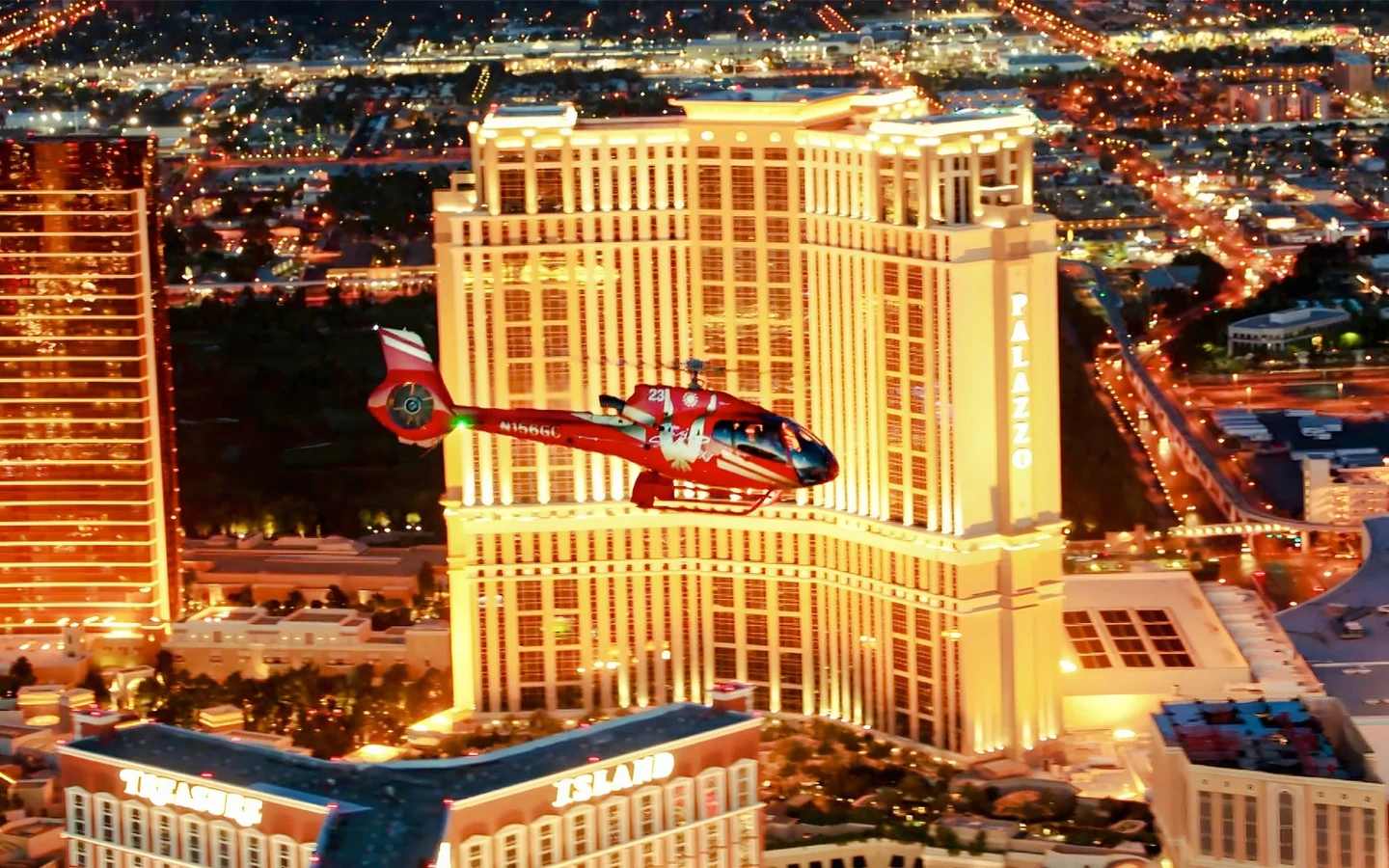 Helicopter flying above the illuminated Las Vegas Strip